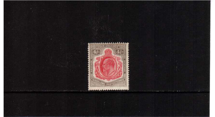 4/- Carmine and Black lightly mounted mint
