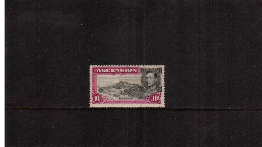 10/- Black and Bright Purple - Perforation 13<br/>
A fine very, very lightly mounted mint single showing the <br/>Gibbons illustrated variety  <b>''Boulder Flaw''.</b><br/>SG Cat 900
<br/><b>UEUa</b>