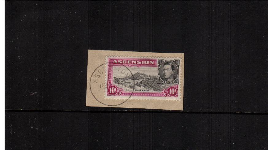 10/- Black and Bright Purple - Perforation 13<br/>
A superb fine used stamp tied to a small piece. Pretty!
<br/><b>QFX</b>