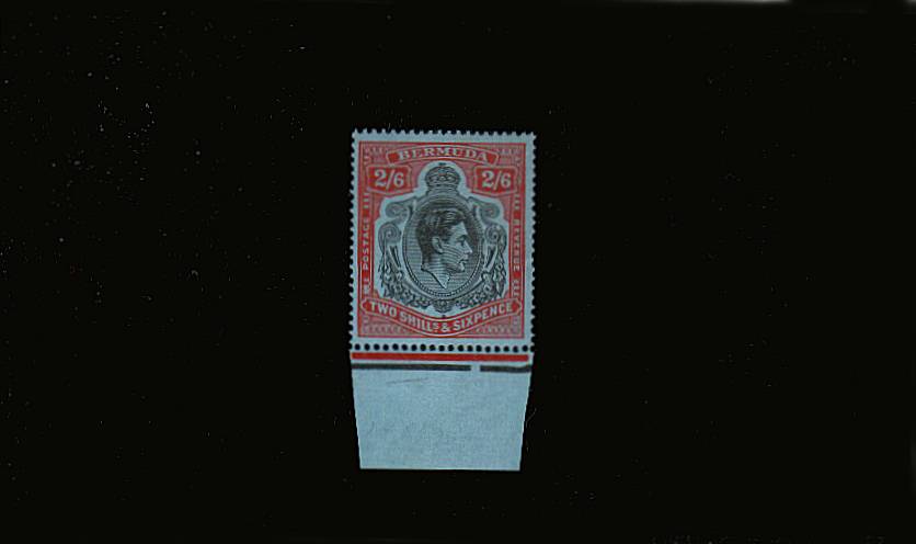 2/6d Black and Red on Grey-Blue - Perforation 14<br/>
A superb unmounted mint lower marginal single<br/>showing <b>Broken Lower Right Scroll</b> on position R5/12<br/>SG Cat 650
<br/><b>QMX</b>