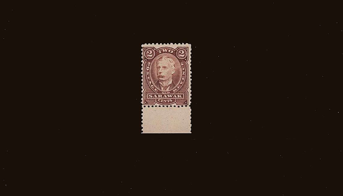 Sir Charles Brooke<br/>
2c Brown-Red - No Watermark<br/>
<b>Second Printing - Perforation 12</b><br/>
A very, very lightly mounted mint lower marginal single.
<br/><b>QQR</b>