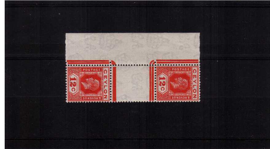 12c Rose-Scarlet. A superb unmounted mint vertical gutter pair showing Die I and Die II together. Rare to find with the bonus of being marginal and unmounted.
<br/><b>ZKB</b>