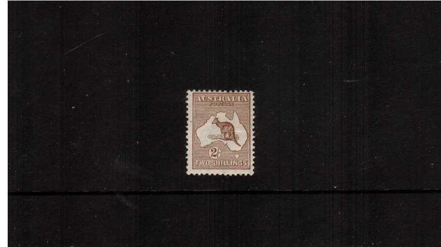The 2/- Brown - Die II<br/>
A lovely and fresh lightly mounted mint stamp clearly from the first watermark.
<br/><b>ZAZ</b>