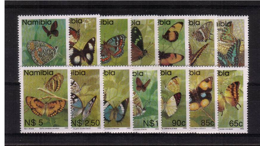 Butterflies set of thirteen plus the bonus of the later N.V.I. single all superb unmounted mint. Note the 5c is the elliptical perforation version.<br/><b>XTX</b>