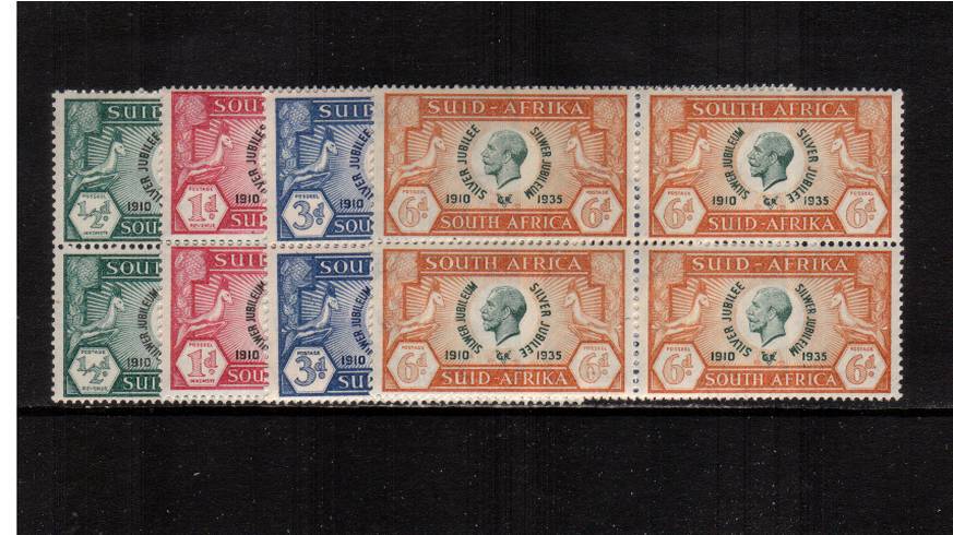 Silver Jubilee set of four in se-tenant pairs as blocks of four superb unmounted mint. 
<br/><b>SEARCH CODE: 1935JUBILEE</b><br/><b>XUX</b>