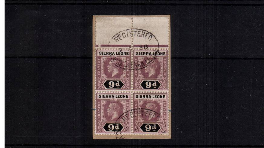 A stunning top marginal block of four of the 9d value cancelled with two light strikes of on oval REGISTERED handstamp tied to a small piece. Lovely! SG Cat for singles 100
<br/><b>QLQ</b>