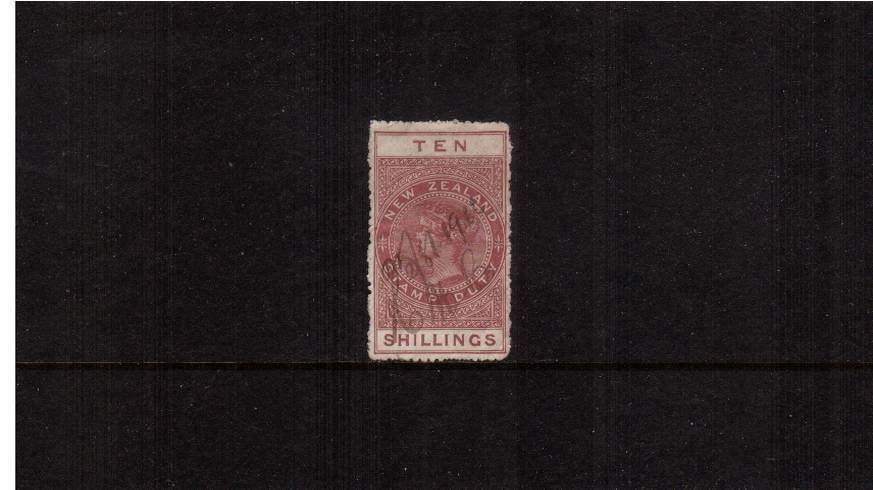 10/- Maroon - Perforation 14<br/>
A fiscallu sed stamp with minor faults. SG Cat 29 
<br/><b>QSQ</b>