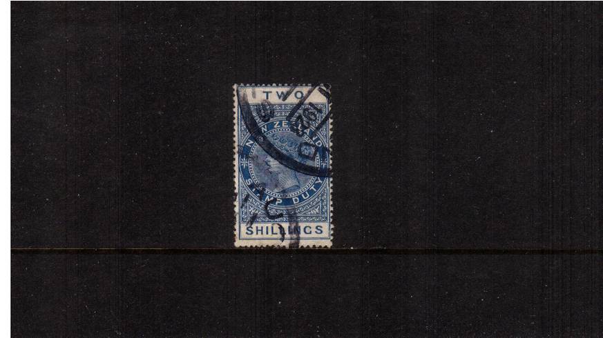 2/- Blue - Perforation 14x14 Postal Fiscal<br/>
A bright and fresh fiscally used single with a feint crease with no other faults. 

<br/><b>QSQ</b>