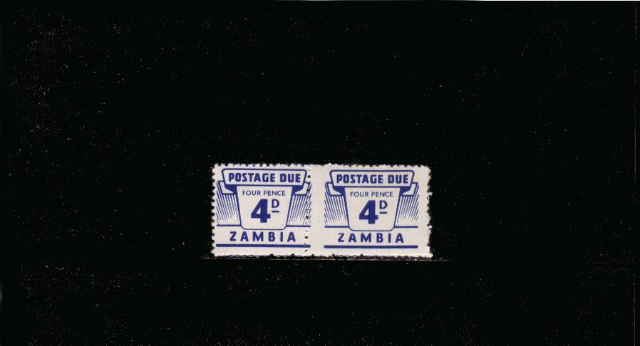 The 4d Ultramarine POSTAGE DUE<br/>
in a superb unmounted mint horizintal pair showing a large perforation shift to left<br/> resulting in a narrow stamp and a wide stamp. Unusual.