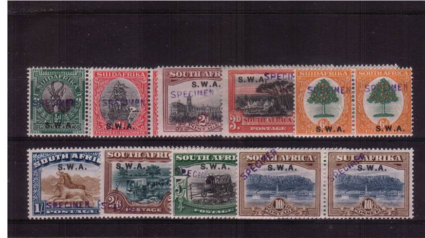 The Pictorials COMPLETE set of nine hand stamped ''SPECIMEN'' fine,<br/>very, very lightly mounted mint. Please note the 4d Brown does not exist<br/>as a ''SPECIMEN'' hence the break in the SG number run.<br/>SG Cat 600.00 
<br/><b>QNX</b>