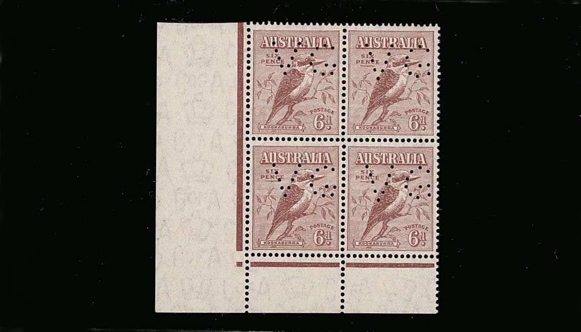 The 6d ''Laughing Kookaburra'' a superb unmounted mint SW corner block of four.  <br/>showing the ''V G'' perfin for the VICTORIA GOVERNMENT.<br/>A scarce pristine block!
<br><b>QQM</b>