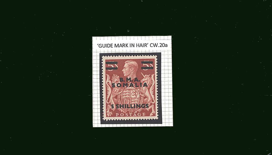 5/- on 5/- Red overprinted B.M.A. SOMALIA<br/>
A superb unmounted mint single<br/>showing the <b>''T'' GUIDE MARK IN HAIR</b> superb unmounted mint.<br/>A rare variety! 
<br><b>BBQ</b>